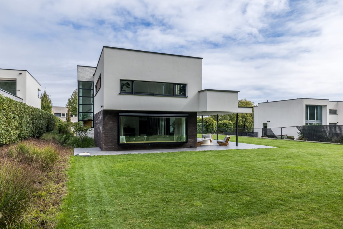 Dark brickwork and corner glazing
