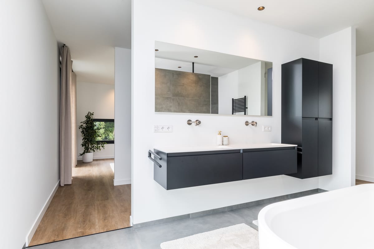 Double vanity with tall cabinet