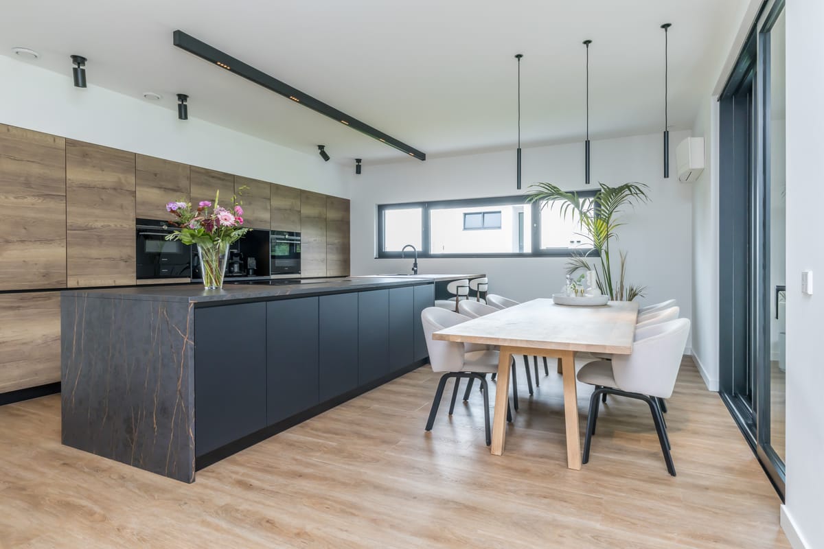Kitchen with island and dining table