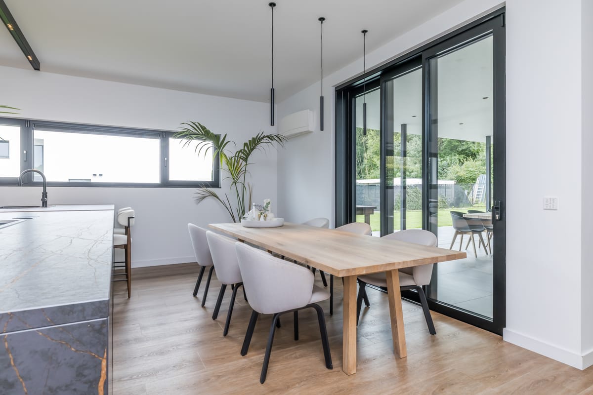 Dining area with a view through to the hall