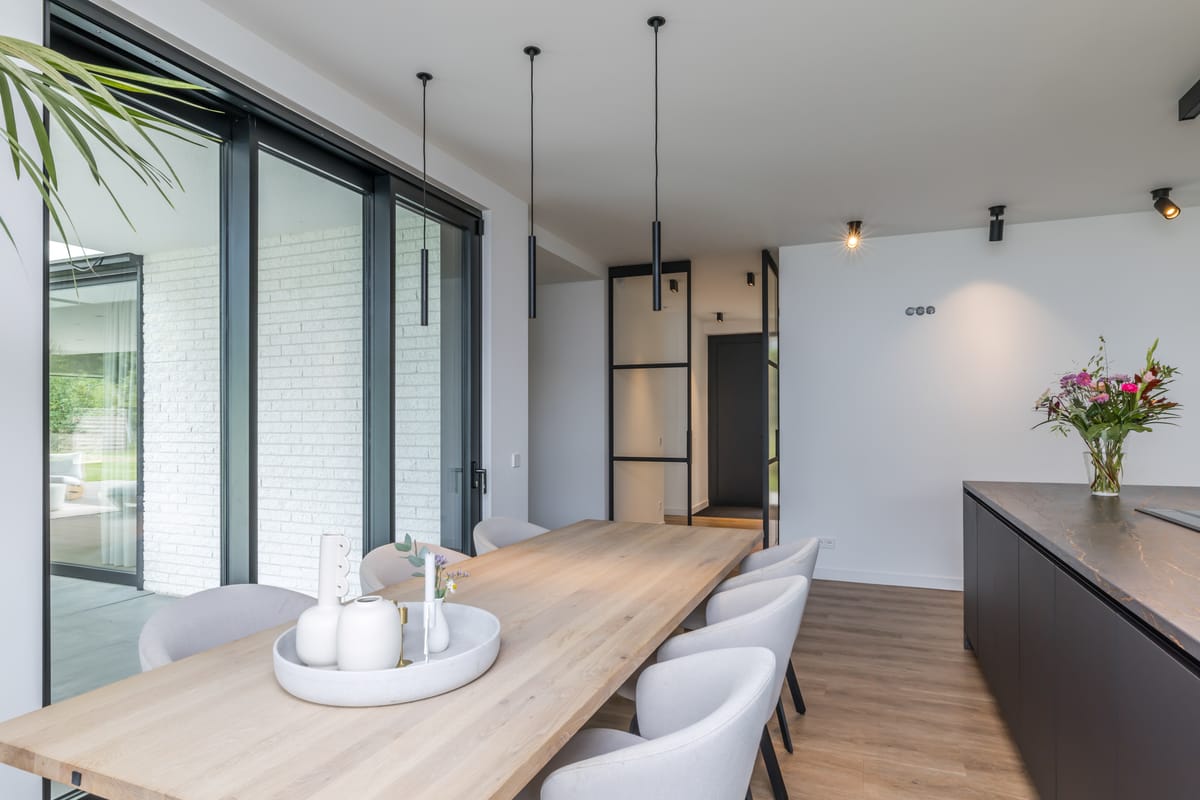 Dining table along the glazed wall